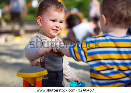 Children Playing With Toys Together