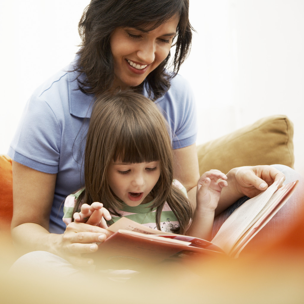 Children Reading Books Together