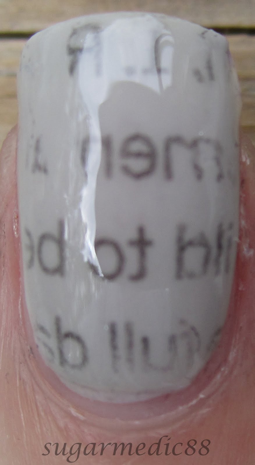 Newspaper Nails With Rubbing Alcohol